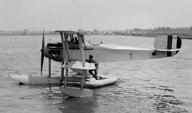 Richard Byrd climbs into the cockpit of his VE-7 in 1925 (US Library of Congress)